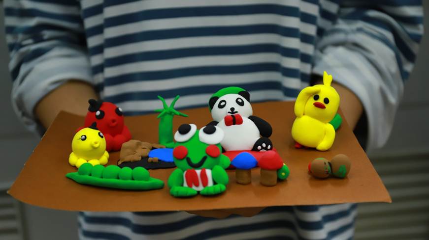 说明: F:\Users\Administrator\Desktop\3月27日 商学院心理健康月系列活动之“陶泥融情，共筑心城”团队手工制作活动顺利举行\作品.JPG